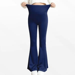 Detail view of high-waist yoga flared pants showing premium stretch material and fit