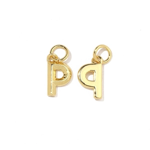 Detailed view of 18K gold plated lowercase 'p' and 'q' letter charms with cubic zirconia
