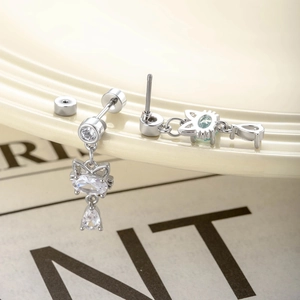 Cat-shaped stud earrings with egg-shaped cubic zirconia pendants in silver finish