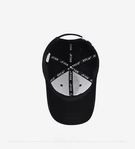 Detail view of cotton baseball cap interior with reinforced NYCA branded stitching