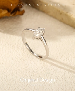 Macro view of marquise-cut moissanite stone set in 925 sterling silver elegant ring