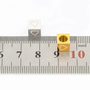 7mm heart-cutout stainless steel square beads in gold and silver finish with ruler