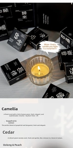 Macro detail of scented candle set with various fragrances in elegant black gift boxes