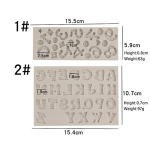 Graue Silikonformen für Großbuchstaben und Zahlen mit Herz- und Sternenmuster