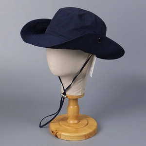 Close-up of quick-dry hiking hat with adjustable chin strap and side metal snaps