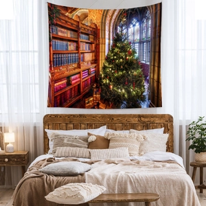 Detail of Christmas library tapestry featuring glowing tree and bookshelf decor