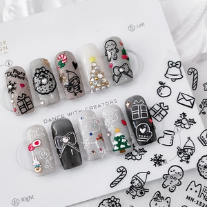 Christmas themed embossed nail stickers with 3D ginger man and tree designs