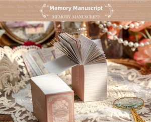 Detailed view of vintage floral scrapbooking paper with lace and pearl decorations