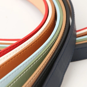 Slim PU leather belts for women in multiple colors with fine stitching for jeans