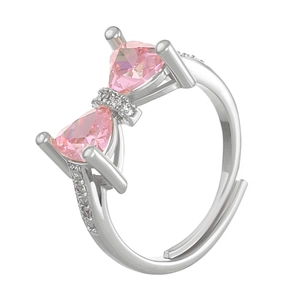 Elegant silver bow ring featuring pink triangle stones and sparkling zircon accents