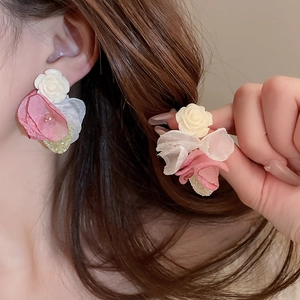 Elegant floral stud earrings featuring pink lace petals and white resin roses for women