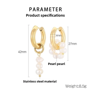 Detail view of asymmetric gold stainless steel earrings with pearl accents and dimensions