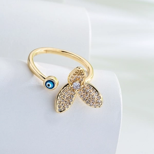 18K gold plated open ring featuring evil eye motif and white cubic zirconia stones