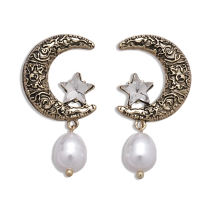 Vintage gold moon and star earrings with faux pearls and rhinestones on white background
