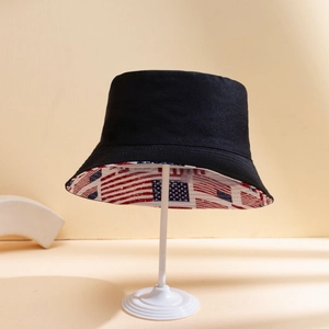 Unisex black canvas bucket hat featuring a stylish American flag print lining