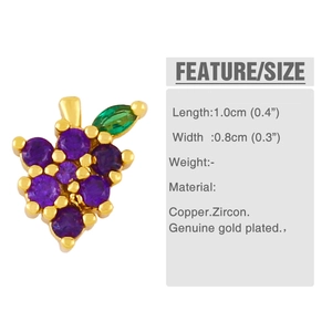 Close-up of gold-plated grape stud earrings with purple zircons and green leaf detail