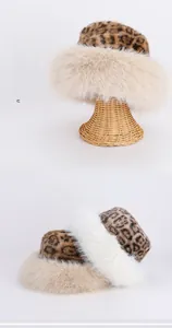 Macro detail of plush leopard print faux fur hat with thick beige fleece lining
