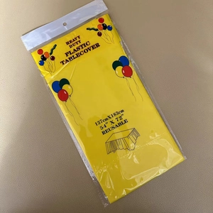 Yellow reusable heavy duty plastic tablecloth in retail packaging 137cm x 183cm