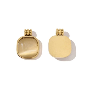 Square gold stainless steel pendant with yellow cat's eye stone inlay on white background