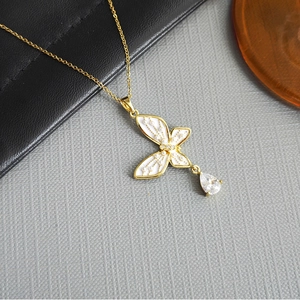 Elegant gold butterfly necklace with white enamel inlay and water drop zircon pendant