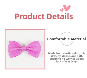 Close-up of pink nylon bow hair clip with detailed ribbed texture and elastic material