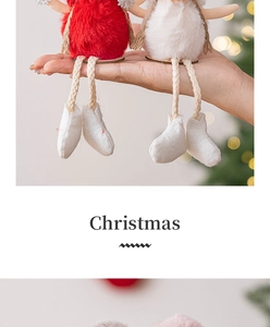 Close-up of plush angel ornaments with wooden bases for Christmas tree decor