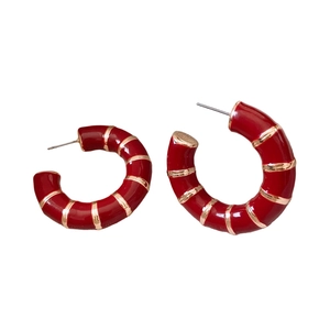 Red C-shaped enamel hoop earrings with gold bamboo texture and stainless steel posts