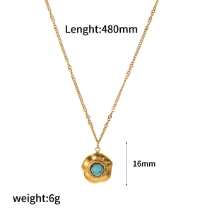 Macro shot of gold necklace with blue tiger eye stone pendant, 480mm length and 6g weight