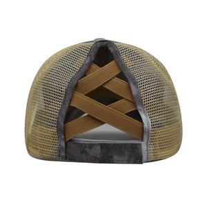 Detail view of the breathable mesh back and elastic criss-cross ponytail hole design