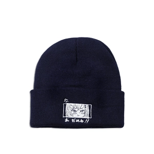 Detail of navy knit beanie featuring high-quality white anime girl embroidery and Japanese text