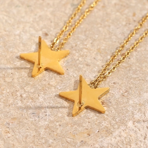 Detailed close-up of 18K gold plated star stud earrings showing the S925 silver post