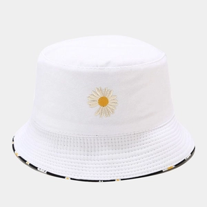 Detail of white cotton bucket hat with daisy embroidery and floral printed lining