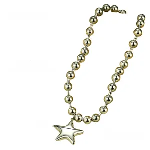Detailed view of large polished stainless steel star pendant on a 44cm bead chain necklace