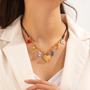 Irregular gold-plated heart sun and moon pendant necklace with enamel eye charms