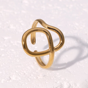 Minimalist gold stainless steel ring with abstract double ring intertwined design