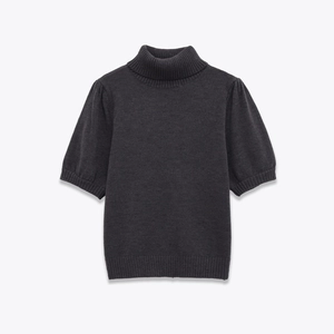 Detailed view of dark grey puff sleeve knit top with ribbed cuffs and high collar neck