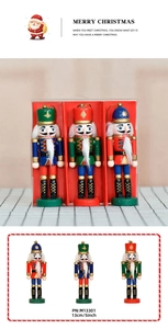 Detail of 13cm wooden nutcracker soldiers in red, green, and blue for Christmas tree decor