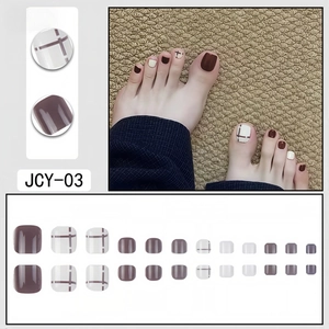 Press-on toenails with brown and beige grid patterns in glossy resin finish