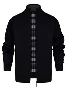 Detailed view of men's black knit cardigan with stylish grey checkered inner lining