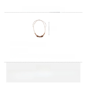 Detail showing 90cm long necklace made of natural wood chips and coconut shell beads