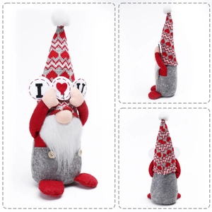Detail of Valentine faceless gnome holding I Love You sign with heart knit hat patterns