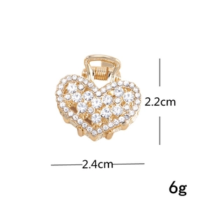 Detailed size specifications for gold heart rhinestone hair claw, 2.2cm by 2.4cm and 6g