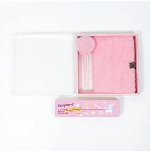 Pink plush A5 diary set with pom-pom pen and unicorn gift box packaging detail