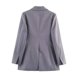 Vue arrière du blazer classique gris à double boutonnage pour femme en tissu sergé premium