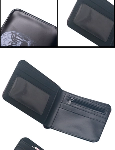 Detailed interior of black leather skull wallet showing card slots and zipper coin pocket