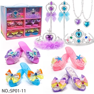 Detailed set of princess dress-up toys with crowns, wands, jewelry and four pairs of shoes