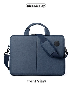 Front view of blue fabric laptop bag showing durable texture and padded shoulder strap