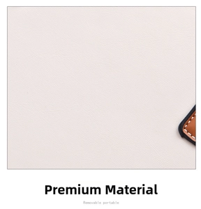 Detailed macro view of beige lychee grain leather with precise contrast stitching
