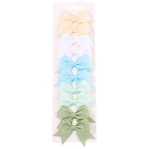 Set di 10 mini mollette a fiocco in grosgrain in colori pastello per neonati e bimbe