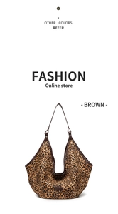 Detail view of large leopard print tote bag with dark brown leather straps and trim